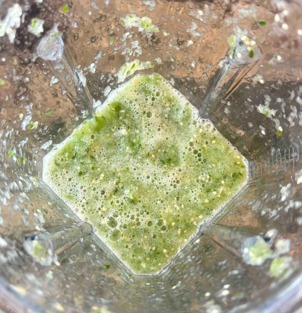 Avocado salsa verde ingredients blended.