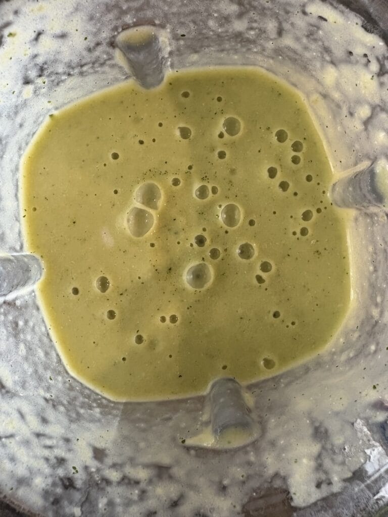 Top view of enchilada suiza sauce ingredients blended.