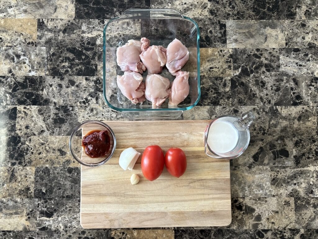 Top view of chicken in creamy chipotle sauce ingredients.