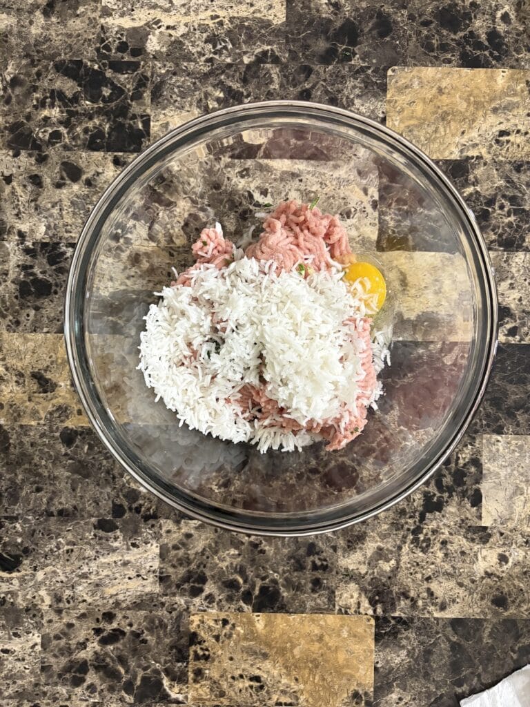 Top view of chipotle meatball ingredients in a bowl before mixing.