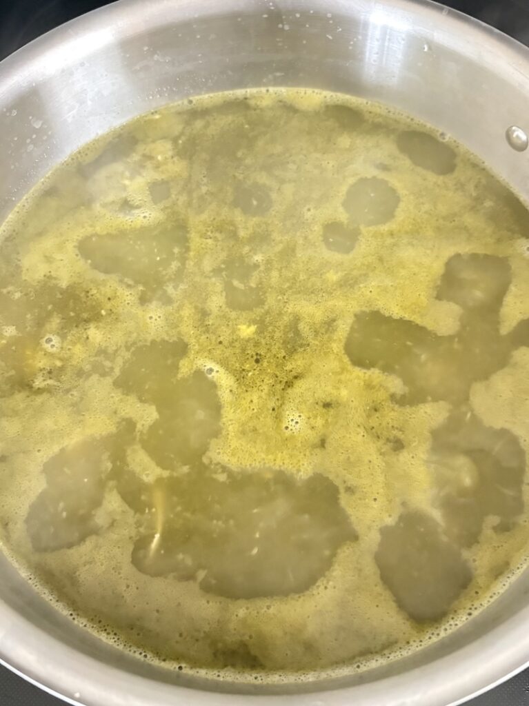 Top view of pozole verde simmering.